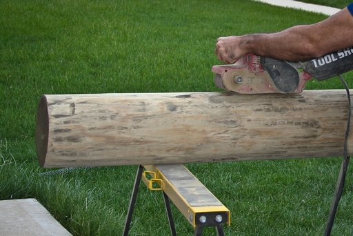 Sanding the log
